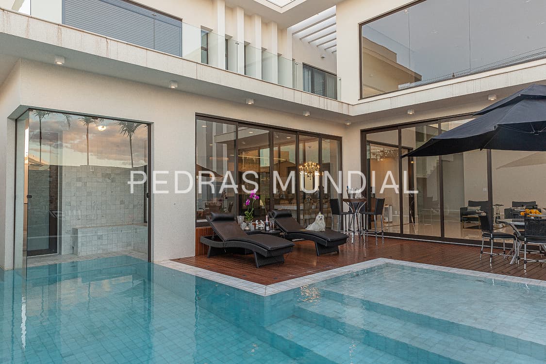 ÁGUA MARINHA 4 Piscina de luxo revestida com pedra Água Marinha
